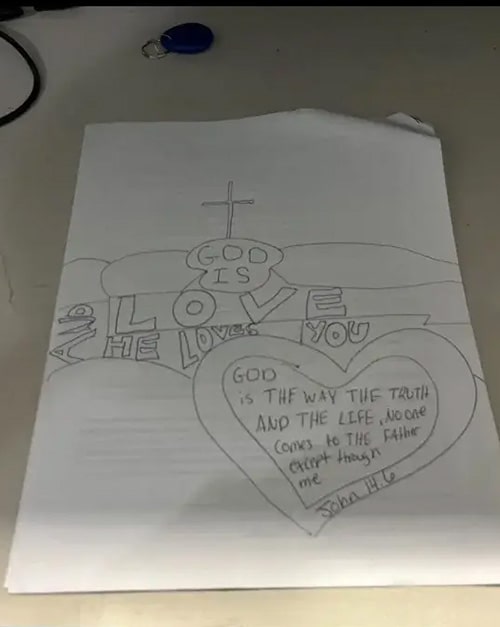 The first design Sabrina Steffans submitted for her parking space features the Bible verse John 14:6, the statement "God is Love," and a picture of a cross and a heart.