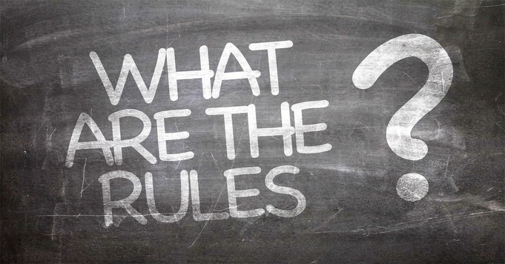 A photo of a blackboard with the question: "What Are the Rules?"