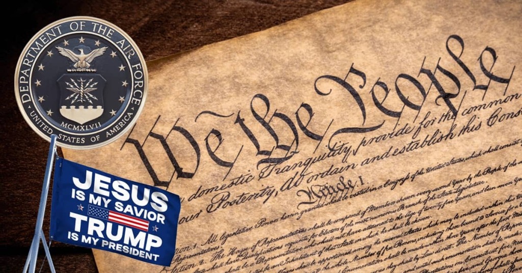 U.S. Air Force seal over the U.S. Constitution beside a blue flag reading “JESUS IS MY SAVIOR TRUMP IS MY PRESIDENT.”