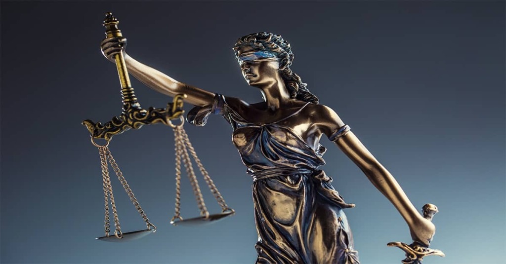 Lady Justice holding the Scales of Justice and the Sword of the Law