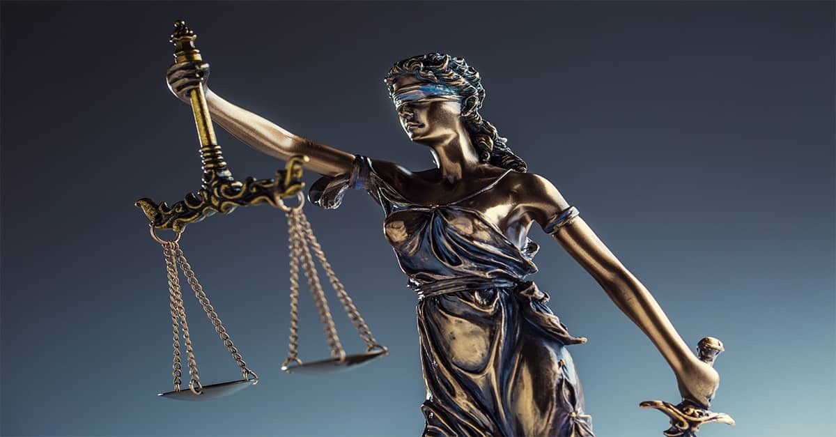 Lady Justice holding the Scales of Justice and the Sword of the Law