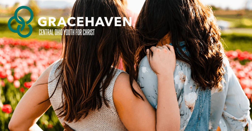 An ad showing two young girls from the back and the works "Gracehaven: Central Ohio Youth for Christ"