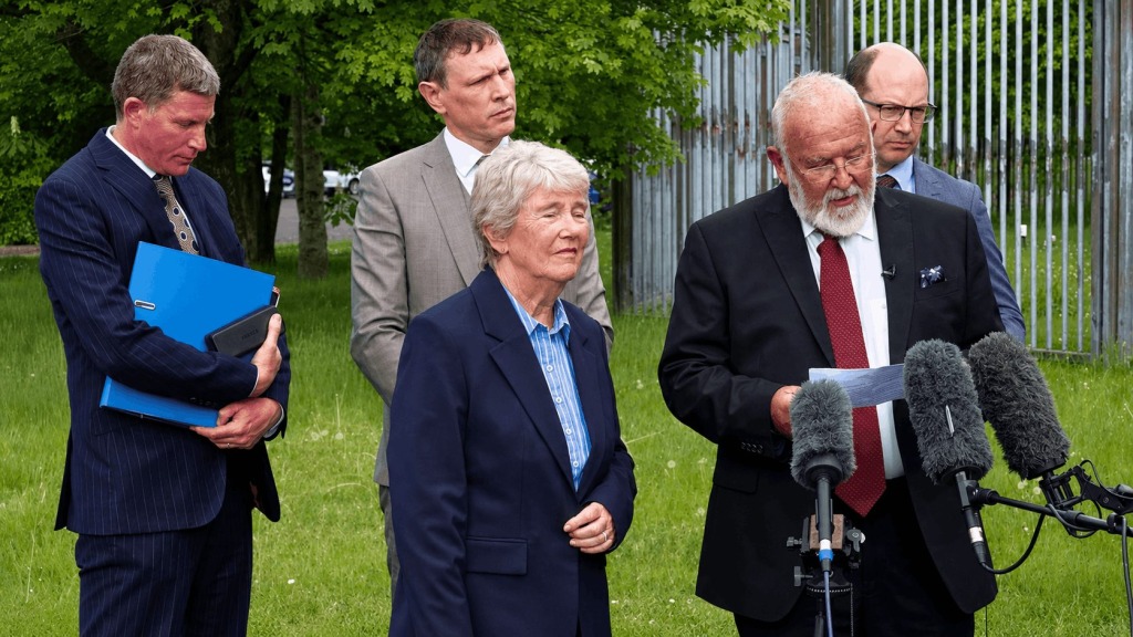Pastor Clive Johnston, surrounded by family and his legal team, speaks to the media after a court found him guilty of violating an abortion buffer zone.