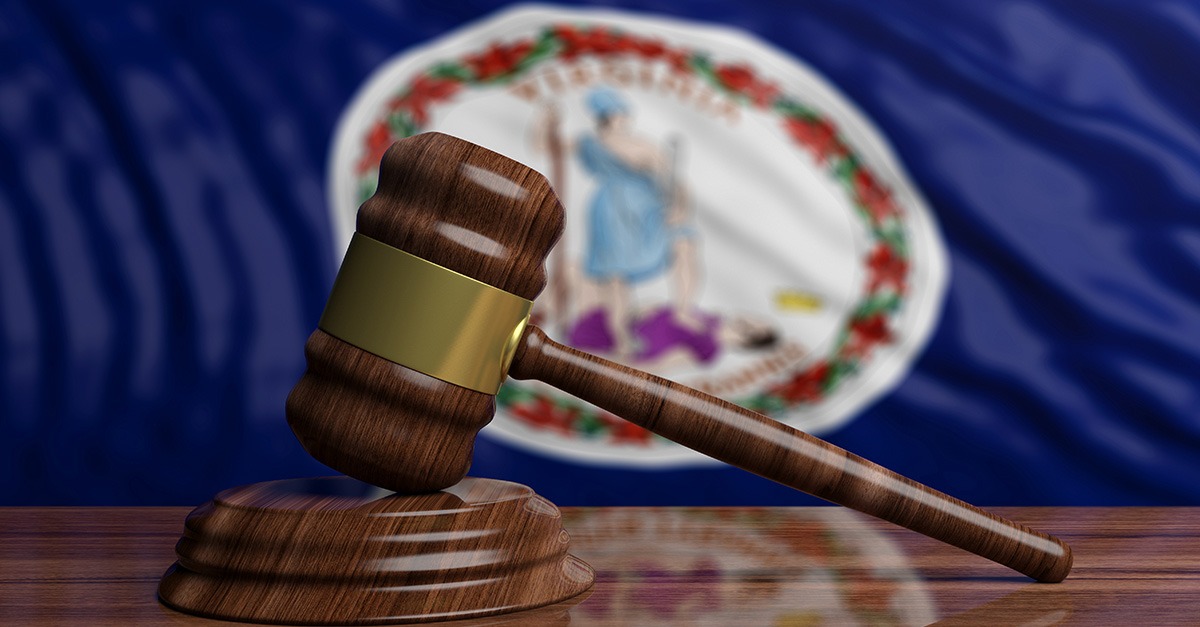 A gavel sits on the Virginia state flag