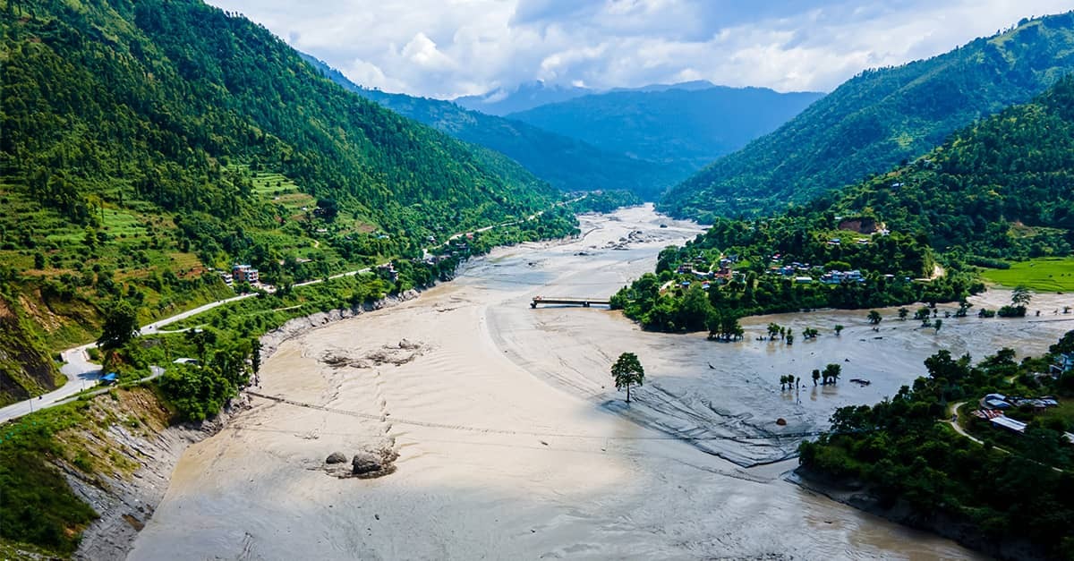 Aerial view shows flood-damaged areas after a massive flash flood swept through the Bhotekoshi River in Nuwakot, Nepal, leaving hundreds dead and thousands missing.