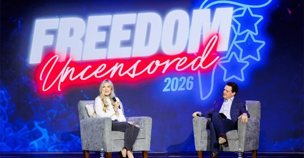 Erika Kirk speaking to the audience during a Q&A session with Standing for Freedom Center Executive Director Ryan Helfenbein on stage at Freedom Uncensored 2026.